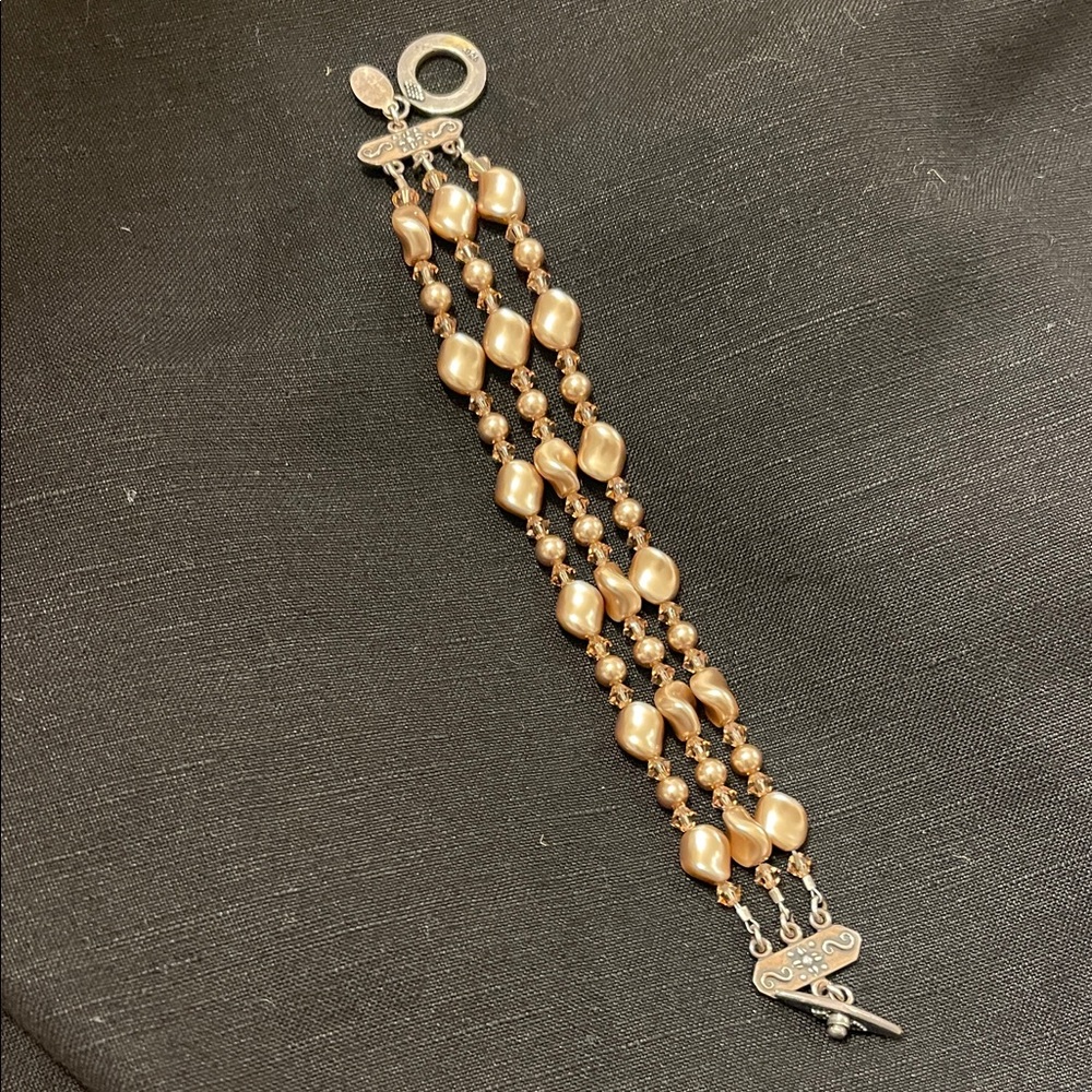 Triple Strand Gold Pearl Bracelet